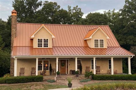 copper metal roof blue house|copper color metal roofing cost.